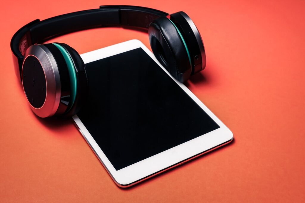 modern headphones with tablet pc orange background 35378 711 modern headphones with tablet pc orange background 35378 711