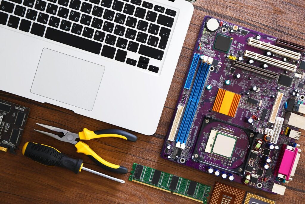 laptop different electronic circuits tools wooden table top view 392895 552040 laptop different electronic circuits tools wooden table top view 392895 552040