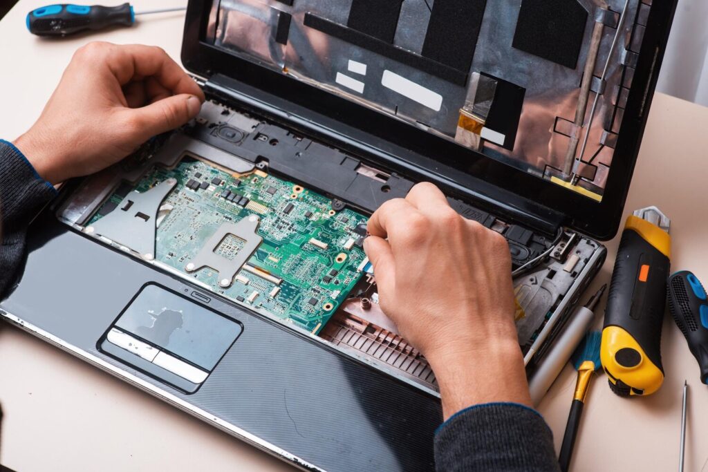 wizard repairs laptop with tools hands 205121 814 wizard repairs laptop with tools hands 205121 814
